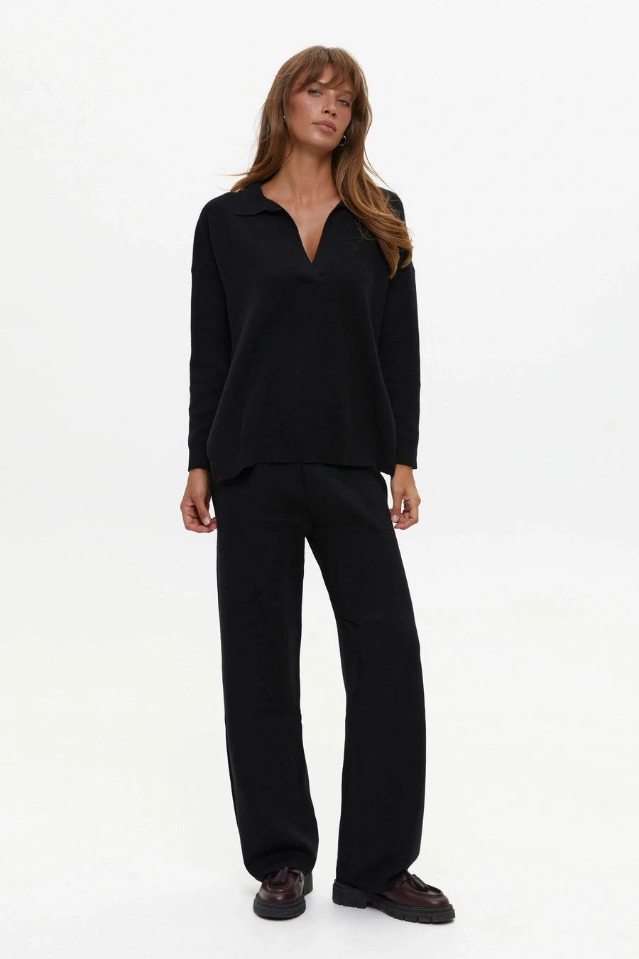 Two piece black suit with Relaxed Fit Polo Sweater and Palazzo Pants fashionable blazer