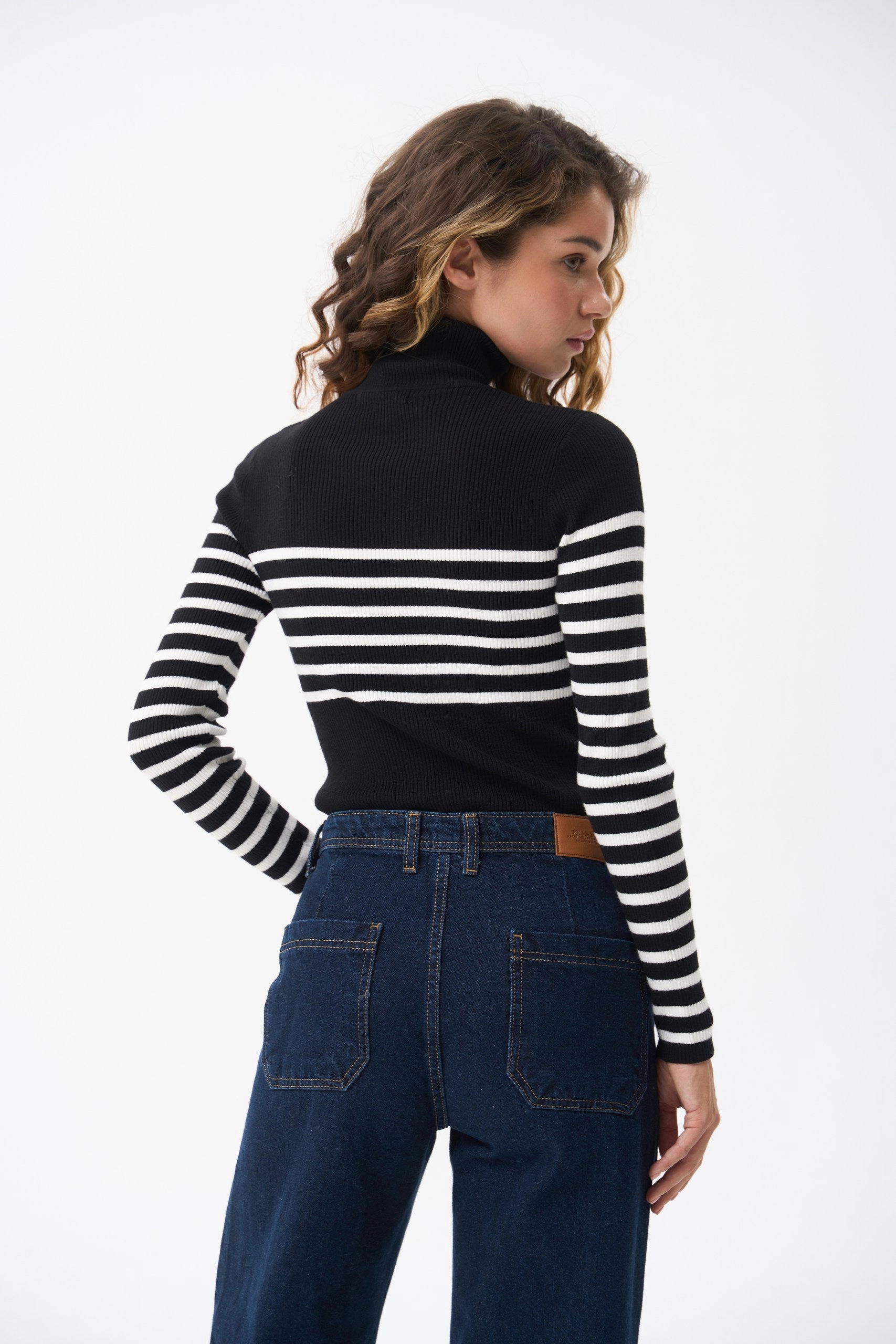 Black turtleneck sweater with a milky stripe Cold-Weather Essential Anti Pilling Treatment